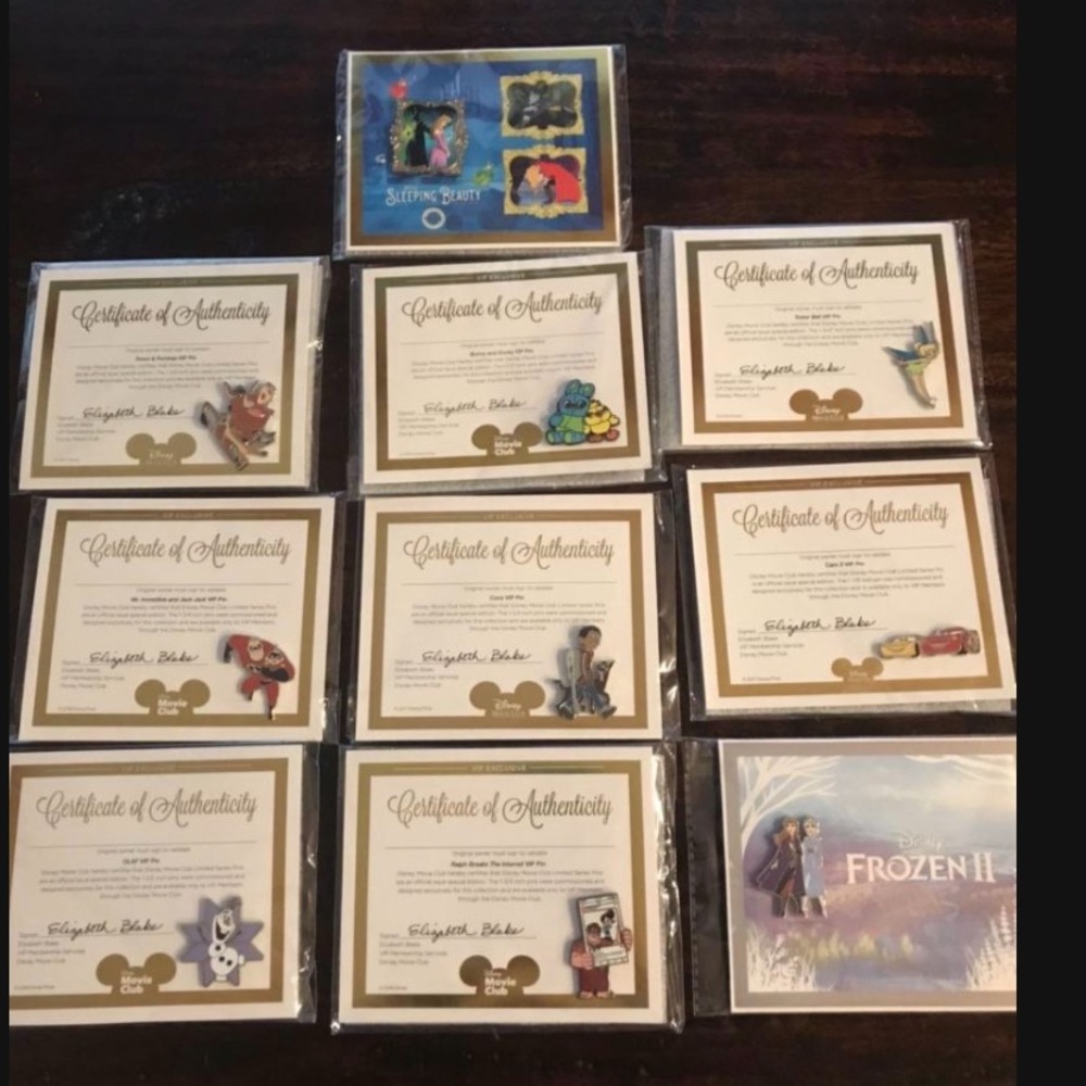 10 Disney trading pins & Certificates of Authenticity